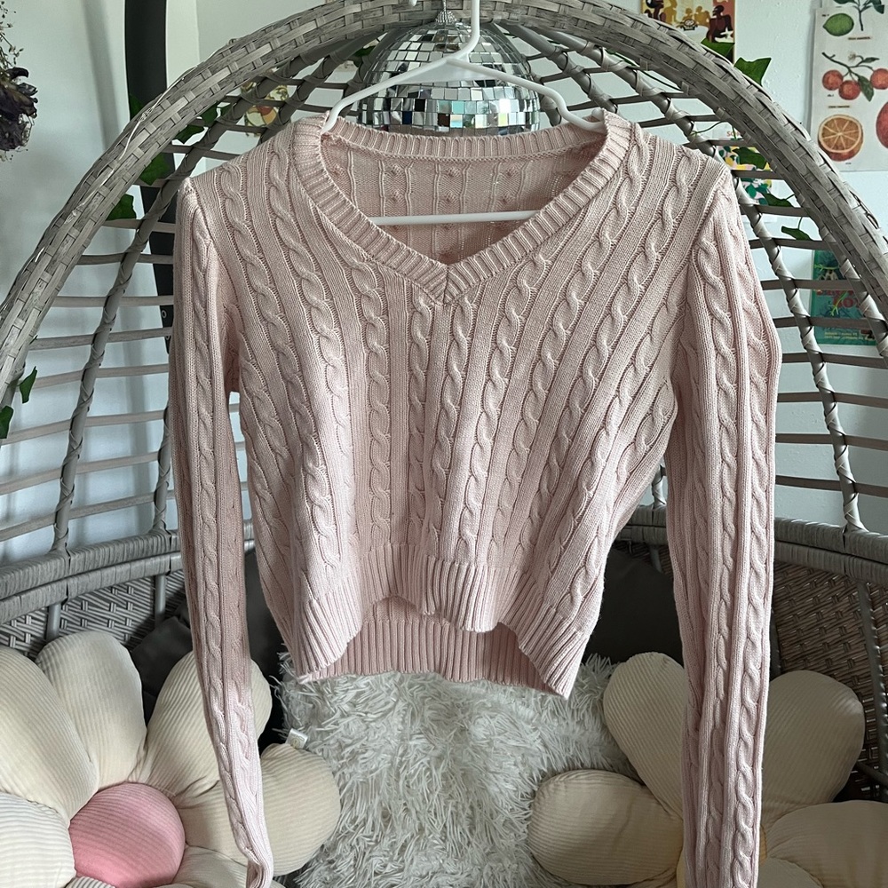 cropped light pink cable knit sweater